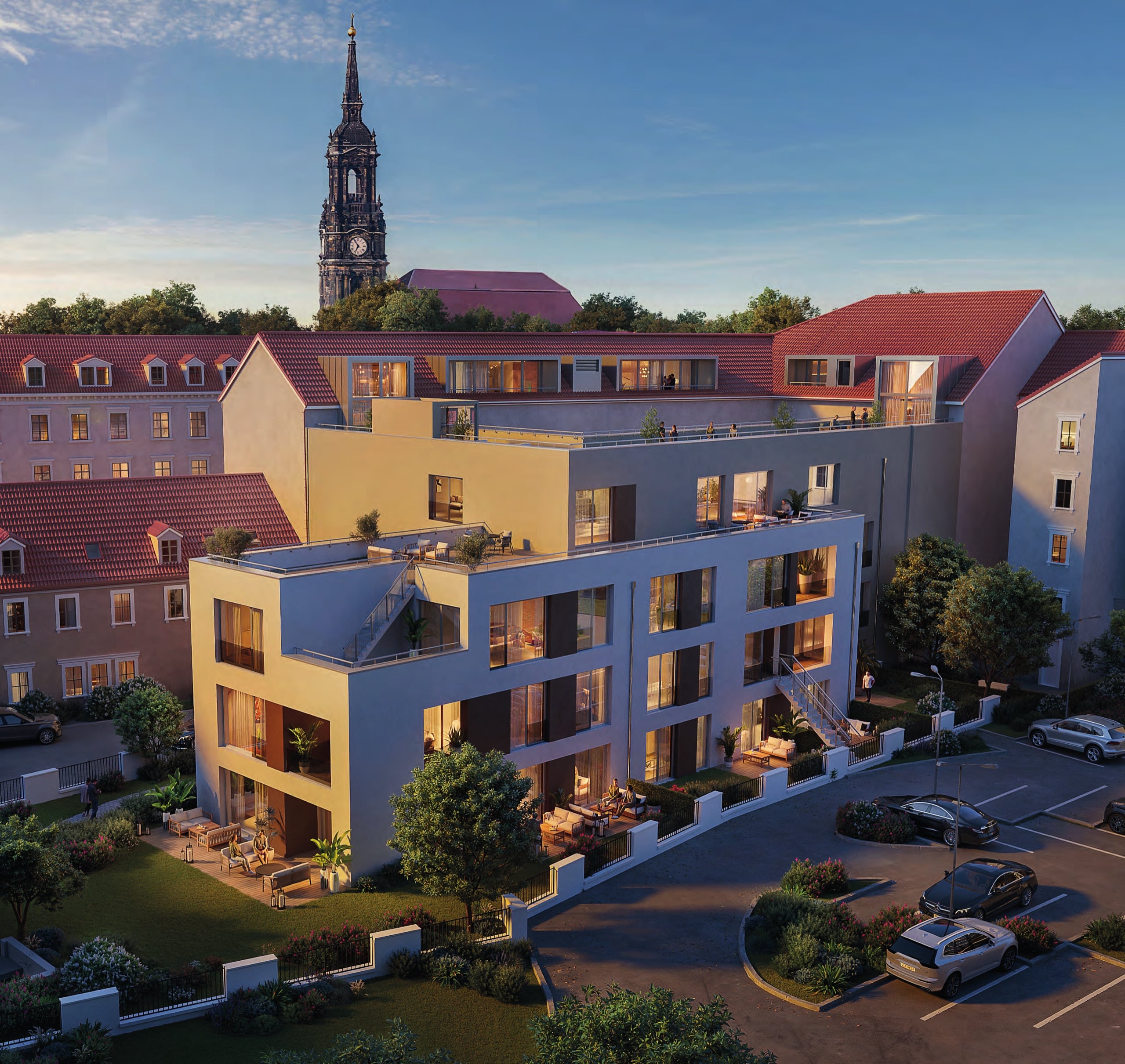 Heinrichhöfe Dresden — Neubau mit Dachterrassen in der Abendstimmung, dahinter der Turm der Dreikönigskirche